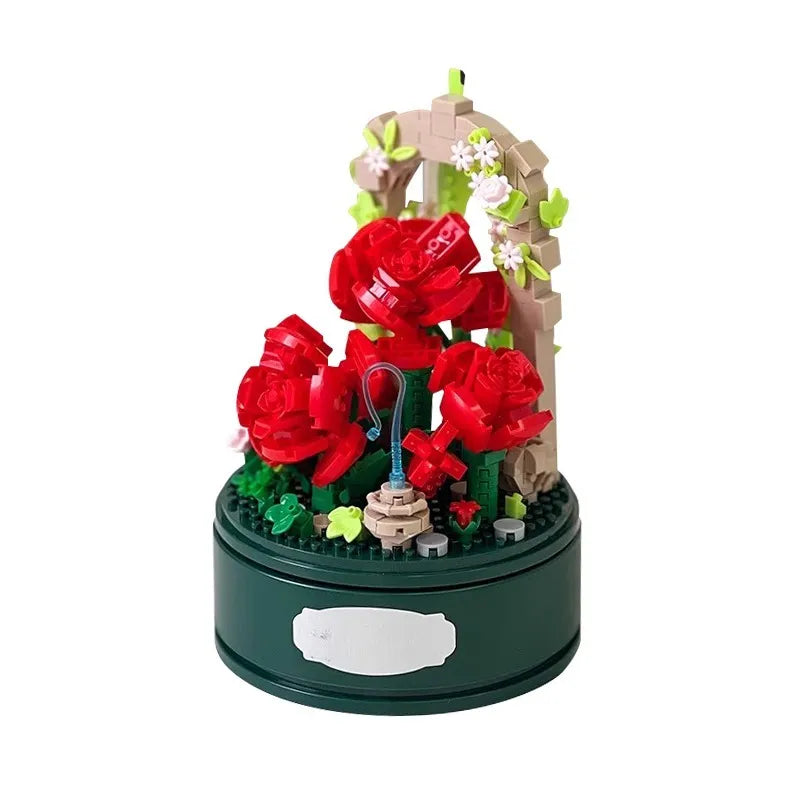 Finished rose garden building set without the dome: red roses, a stone garden arch and a green music box base
