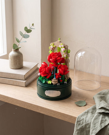The finished rose garden building set on a shelf with the dome set aside
