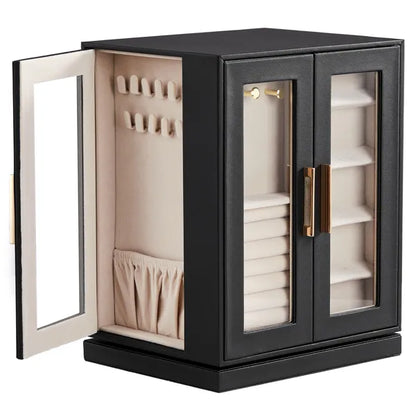 Side door open: two rows of velvet necklace hooks and a pleated pocket, with ring rolls and earring shelves behind the front doors